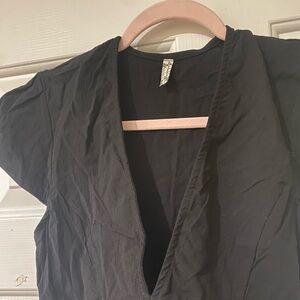 NWT deep v-neck body suit.